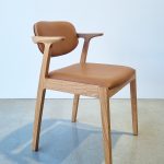 Kinross Dining Chair. Handcrafted in a variety of classic timbers with premium leather options. Pictured in WA Blackbutt with Pelle Ultimo Tan leather.