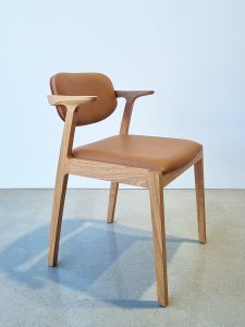 Kinross Dining Chair. Handcrafted in a variety of classic timbers with premium leather options. Pictured in WA Blackbutt with Pelle Ultimo Tan leather.