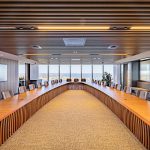 Custom Boardroom Table L9200 x W5000 in Australian Blackwood with integrated power and data. Compliant with strict human factors guidelines. Location- One The Esplanade, Elizabeth Quay, Perth Western Australia