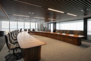 Custom Boardroom Table L9200 x W5000 in Australian Blackwood with integrated power and data. Compliant with strict human factors guidelines. Location- One The Esplanade, Elizabeth Quay, Perth Western Australia Photo- Dion Robeson