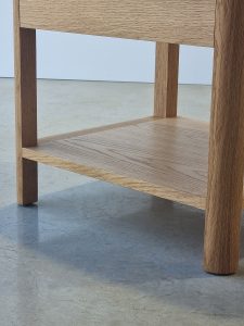 Custom 2 drawer bedside table with shelf in American Oak.