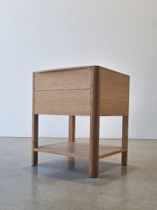 Custom 2 drawer bedside table with shelf in American Oak.